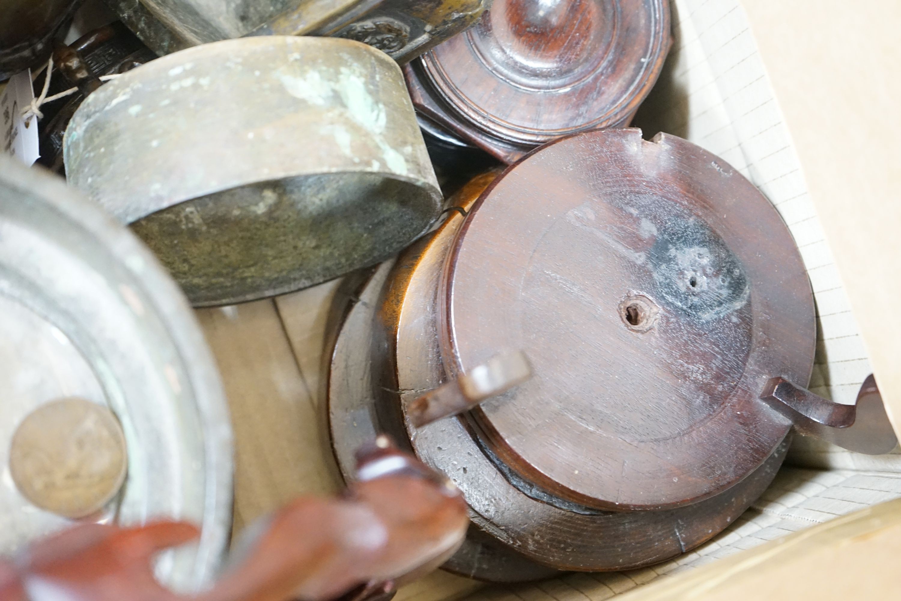 A group of Japanese bronze vases and sundry hardwood stands